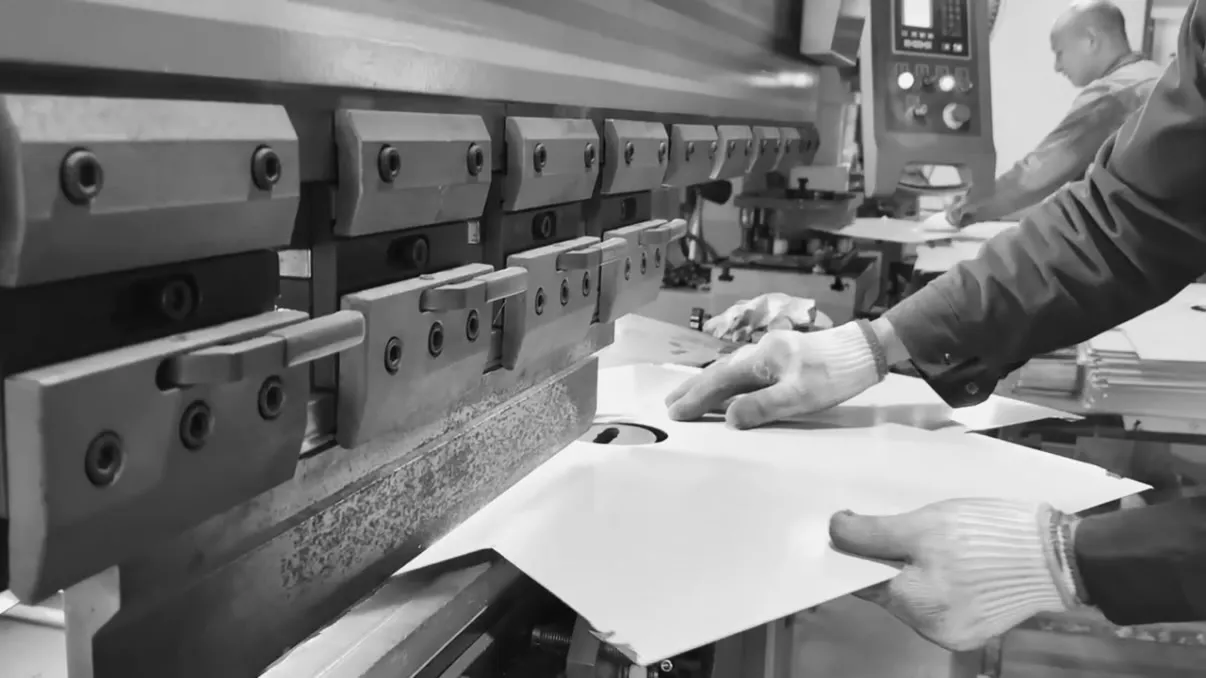 Robotic arm manufacturing equipment with horizontal and vertical components for precision assembly of sanitary products